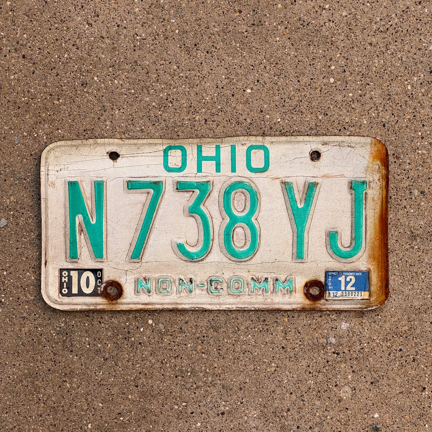 Photo of a 1985 1991 Ohio Truck License Plate Auto Tag 1 Vintage Garage Non Commercial N 738 YJ with original patina