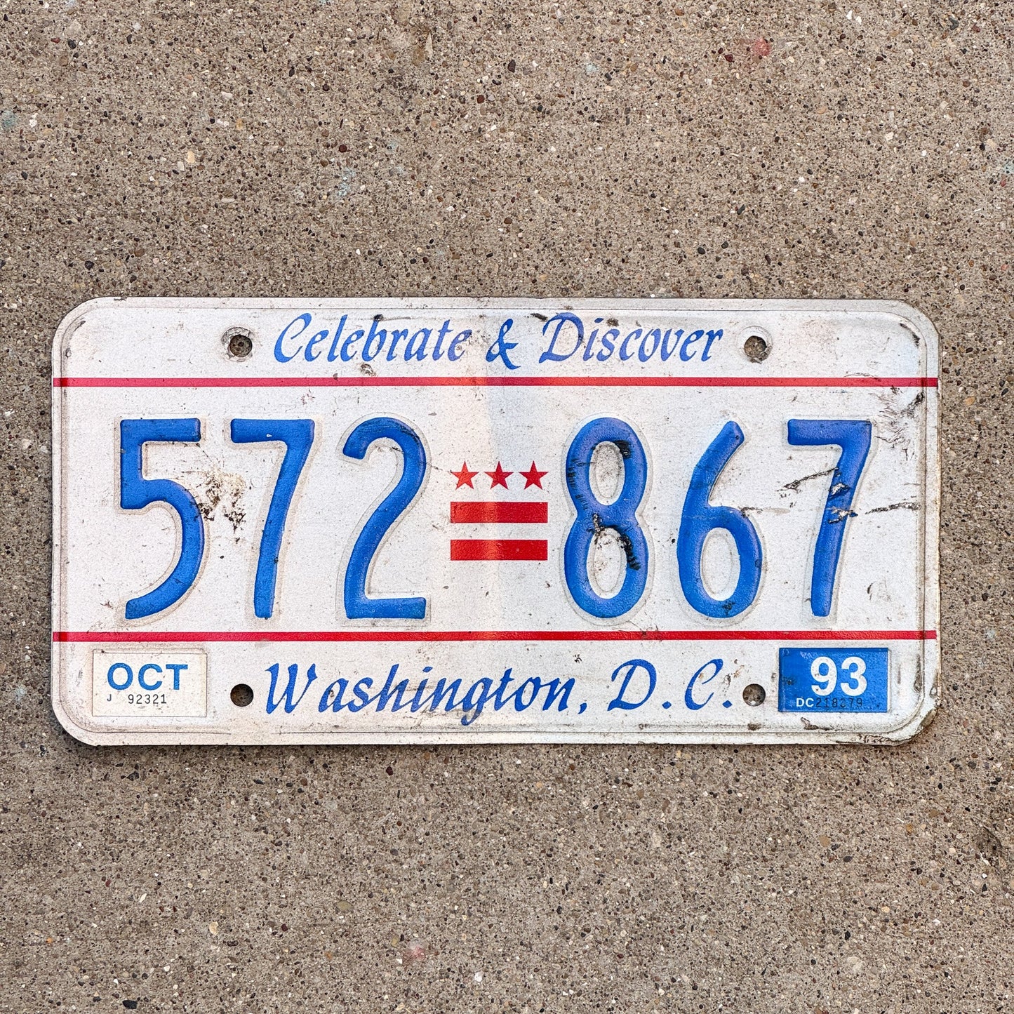 Photo of a 1985 1993 Washington DC License Plate Auto Tag Garage Decor Vintage Celebrate and Discover 572 867 with original patina