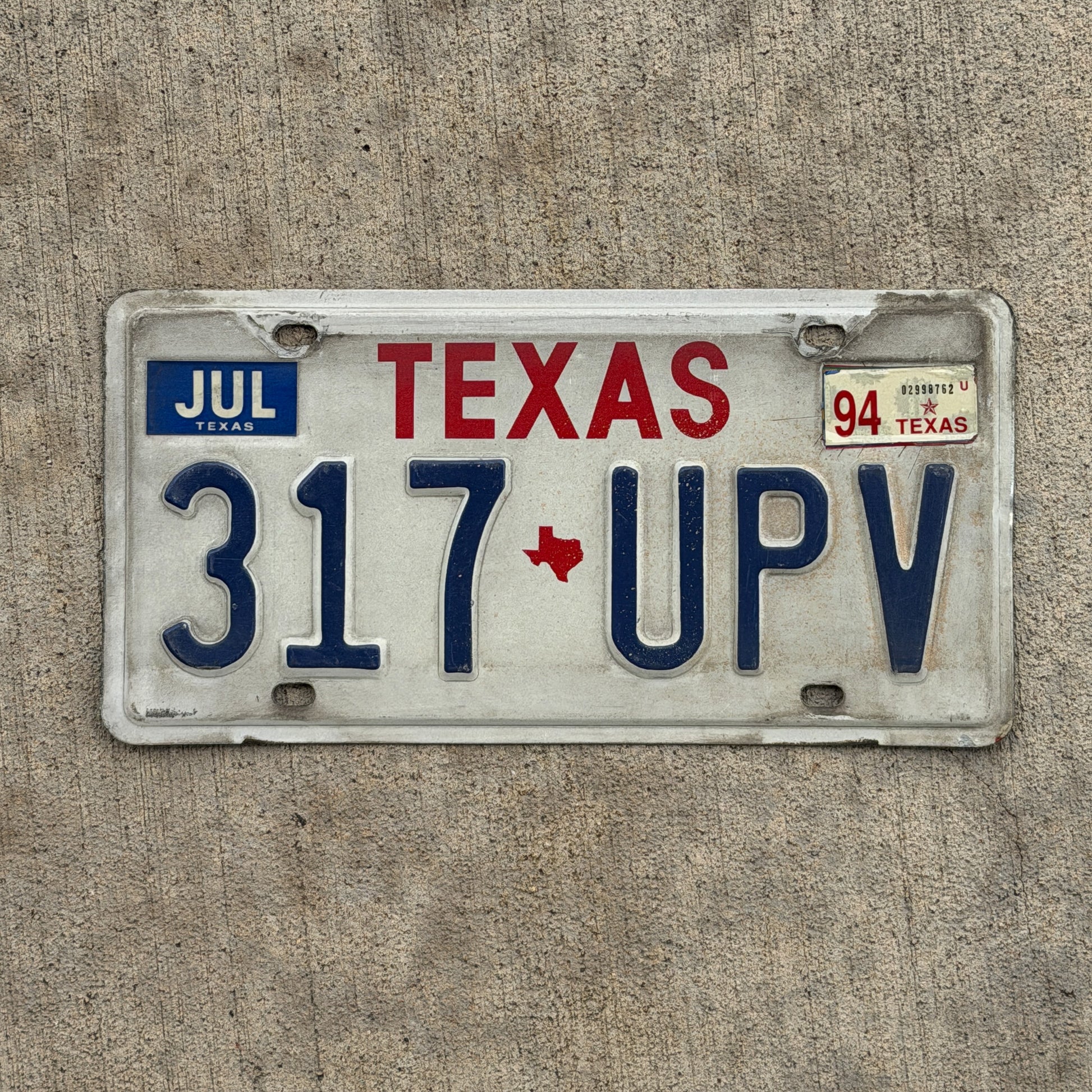 Photo of a 1985 1994 Texas License Plate Auto Tag Garage Decor Vintage 317 UPV with original patina