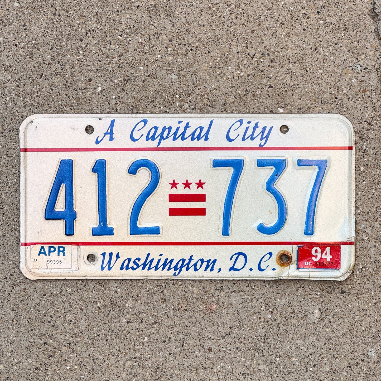 Photo of a 1985 1994 Washington DC License Plate Auto Tag Garage Decor Vintage A Capital City 412 737 with original patina