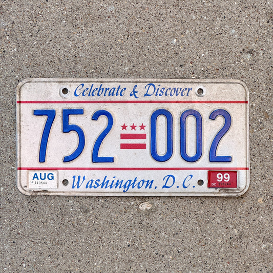 Photo of a 1985 1999 Washington DC License Plate Auto Tag Garage Decor Vintage Celebrate and Discover 752 002 with original patina