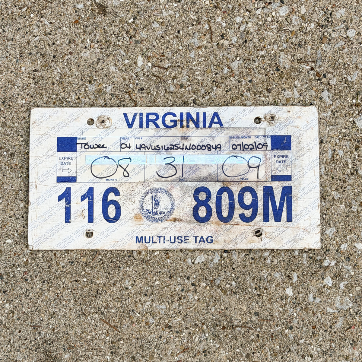 Photo of a 1985 2009 Virginia Temporary License Plate Auto Tag Garage Decor Vintage Fiberboard Tower 116 809 M with original patina
