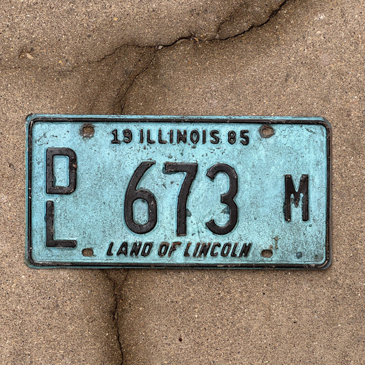 Photo of a 1985 Illinois Dealer License Plate Auto Tag 2 Vintage Garage Merritt's Sterling Ford Mercury Lincoln Dealer 673 M with original patina
