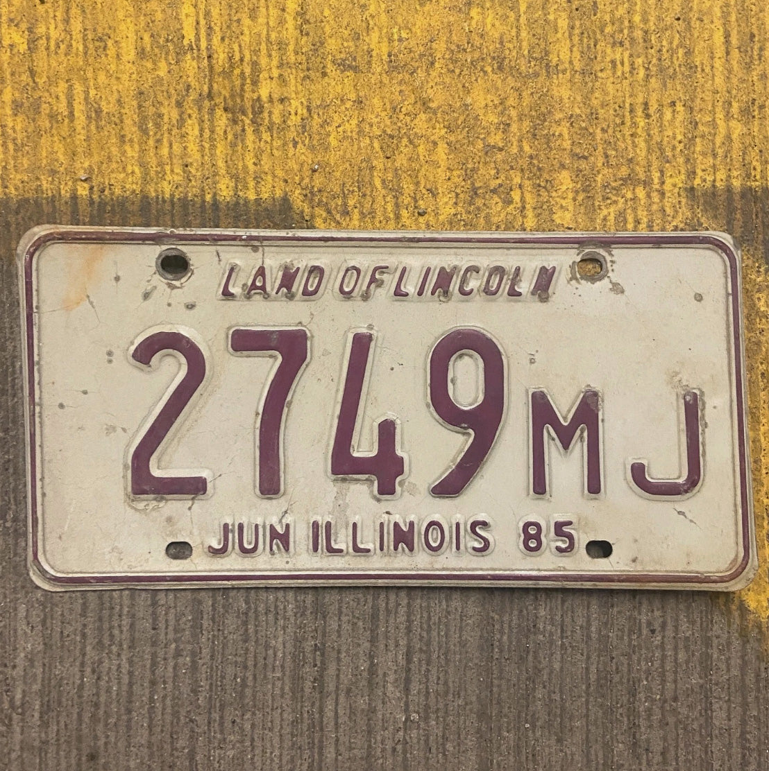 Photo of a 1985 Illinois Mileage Tax License Plate Auto Tag 1 Garage Decor 2749 MJ