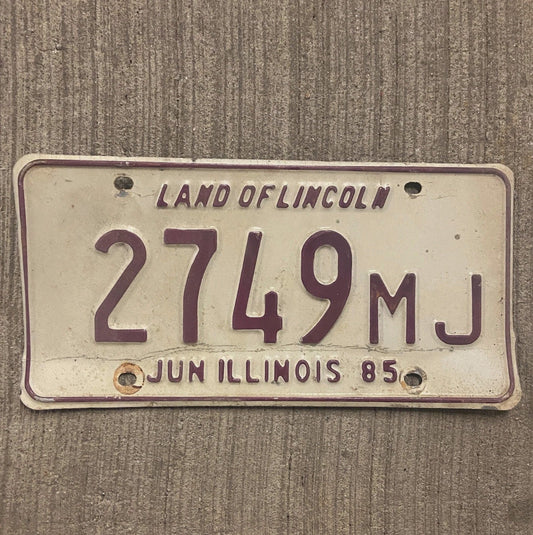 Photo of a 1985 Illinois Mileage Tax License Plate Auto Tag 2 Garage Decor 2749 MJ