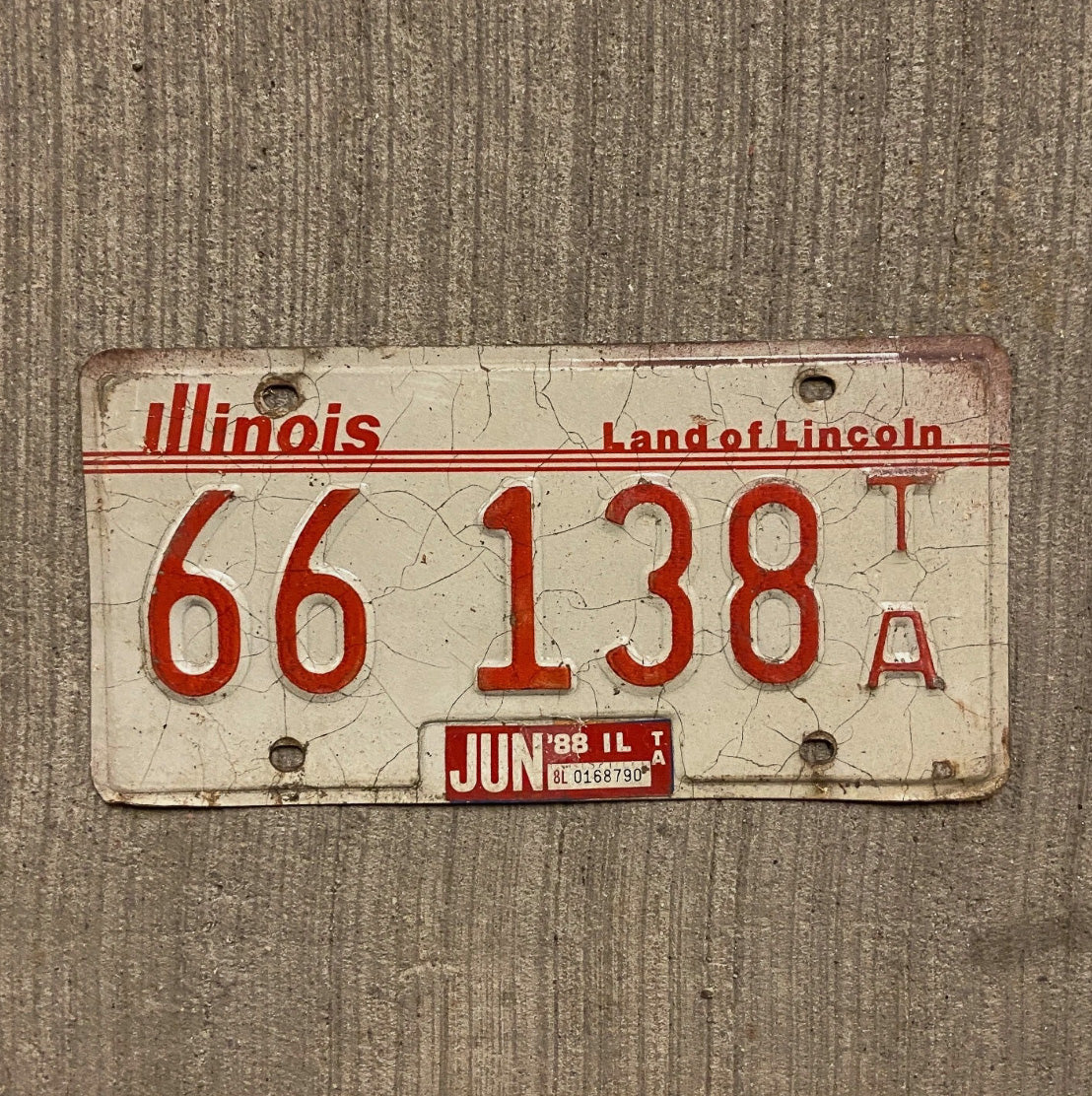 Photo of a 1985 Illinois Trailer License Plate Auto Tag Garage Decor Vintage 66 138 TA