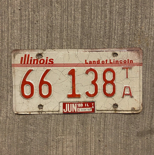 Photo of a 1985 Illinois Trailer License Plate Auto Tag Garage Decor Vintage 66 138 TA