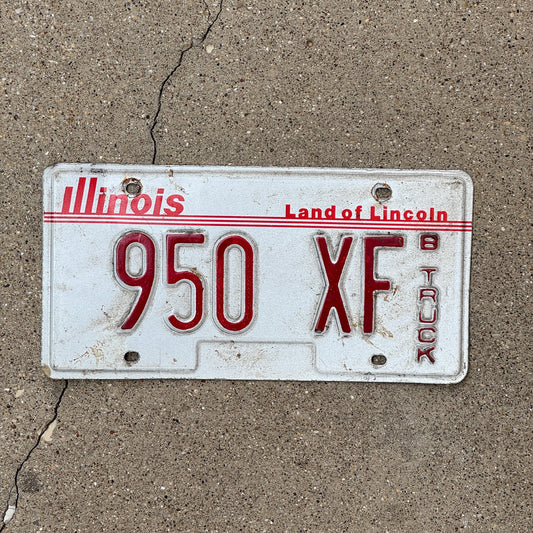 Photo of a 1985 Illinois Truck License Plate Auto Tag Garage Decor Vintage B Class 950 XF