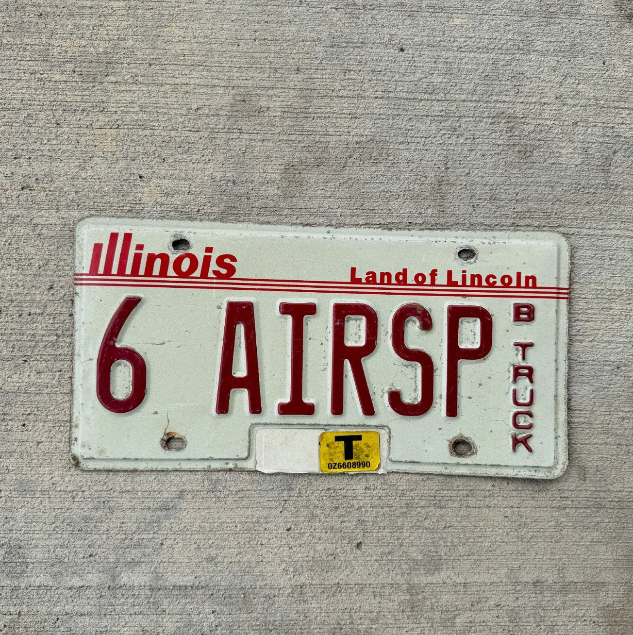 Photo of a 1985 Illinois Truck Vanity License Plate Auto Tag 1 Garage Decor Air Support Aerospace 6 AIRSP