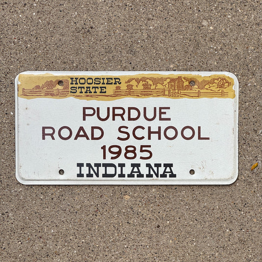 Photo of a 1985 Indiana License Plate Auto Tag Garage Decor Vintage Big Ten Purdue Road School with original patina