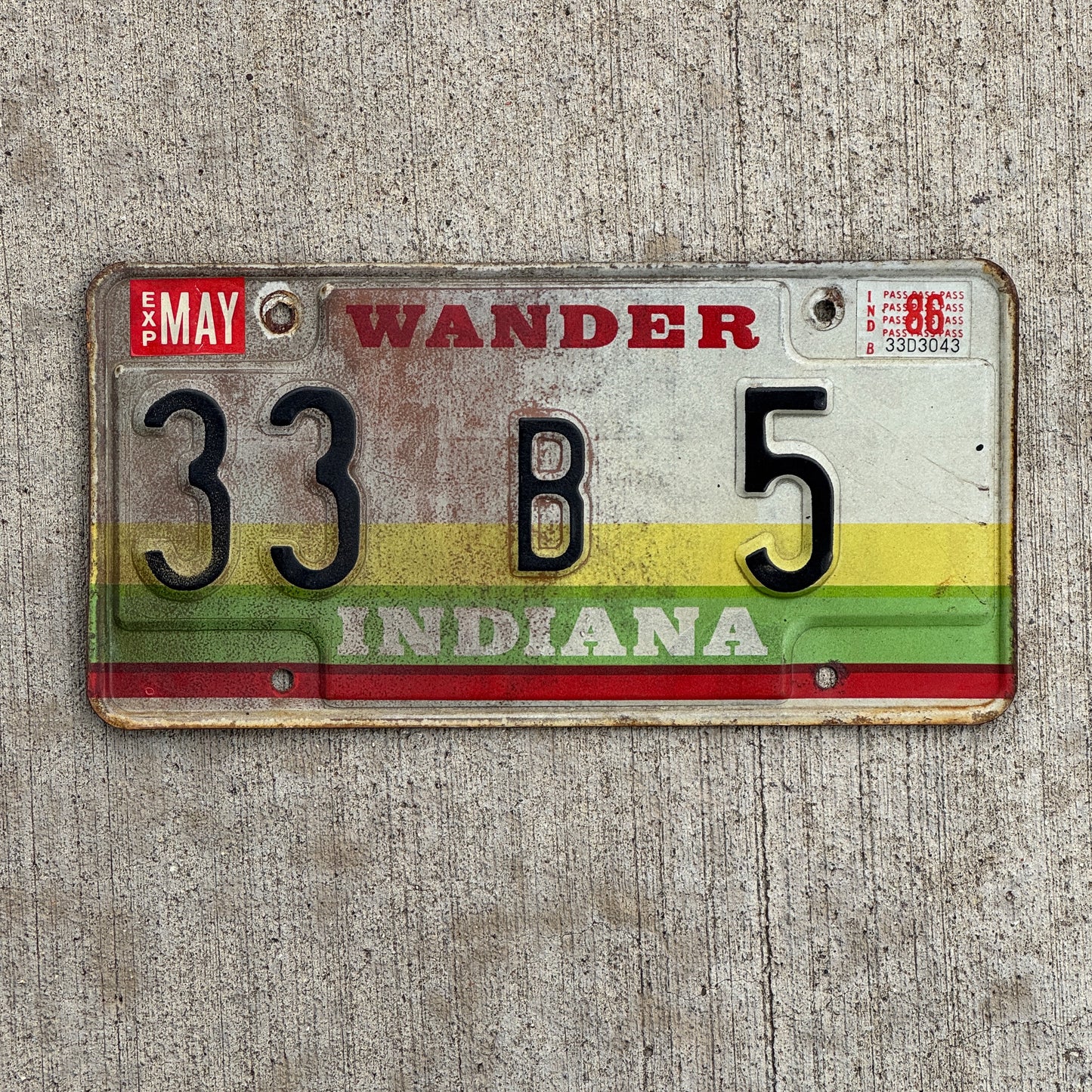 Photo of a 1985 Indiana License Plate Auto Tag Garage Decor Vintage Henry County Low Number 33 B 5 with original patina