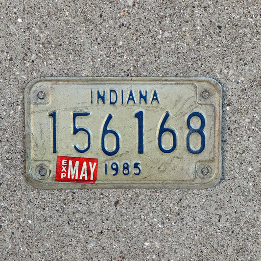 Photo of a 1985 Indiana Motorcycle License Plate Auto Tag Garage Decor Vintage 156168 with original patina