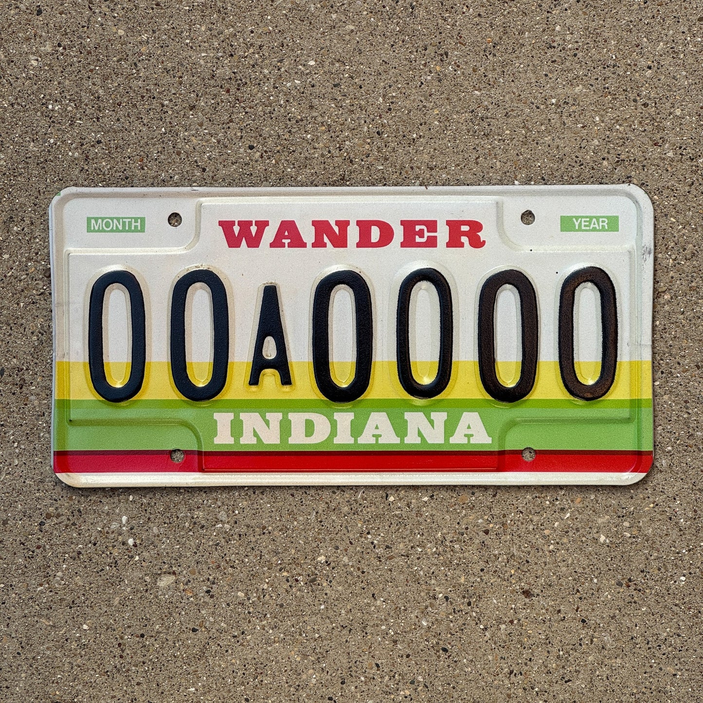 Photo of a 1985 Indiana Sample License Plate Auto Tag 1 Garage Decor 00A0000 with original patina