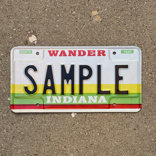Photo of a 1985 Indiana Sample License Plate Auto Tag Garage Decor Vintage SAMPLE with original patina