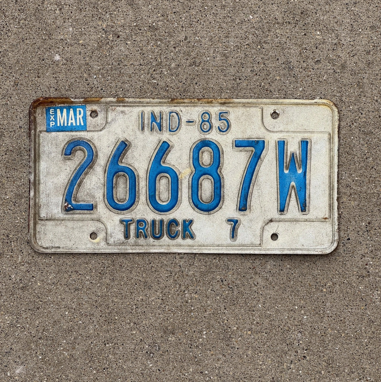 Photo of a 1985 Indiana Truck License Plate Auto Tag Garage Decor 26687 W