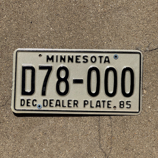 Photo of a 1985 Minnesota Dealer License Plate Auto Tag Garage Decor Vintage Repeat Repeating D 78000