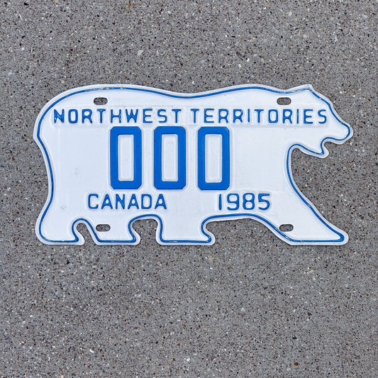 Photo of a 1985 Northwest Territories Sample License Plate Auto Tag Garage Decor Vintage Polar Bear 000
