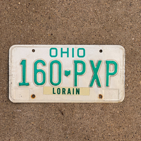 Photo of a 1985 Ohio License Plate Auto Tag 1 Vintage Garage 160 PXP with original patina