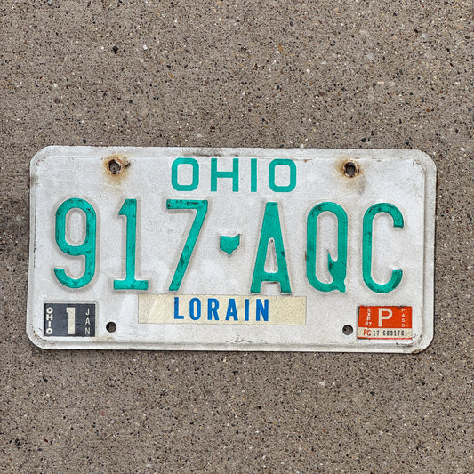 Photo of a 1985 Ohio License Plate Auto Tag 1 Vintage Garage 917 AQC with original patina