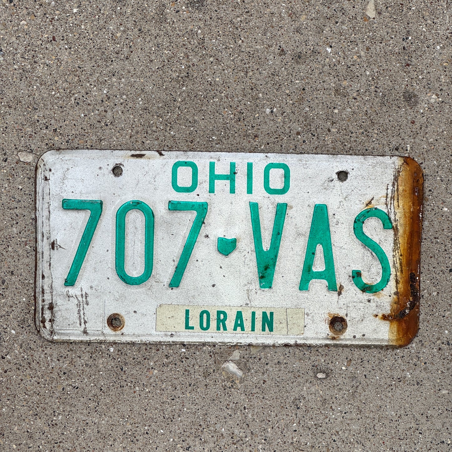 Photo of a 1985 Ohio License Plate Auto Tag 2 Vintage Garage 707 VAS with original patina