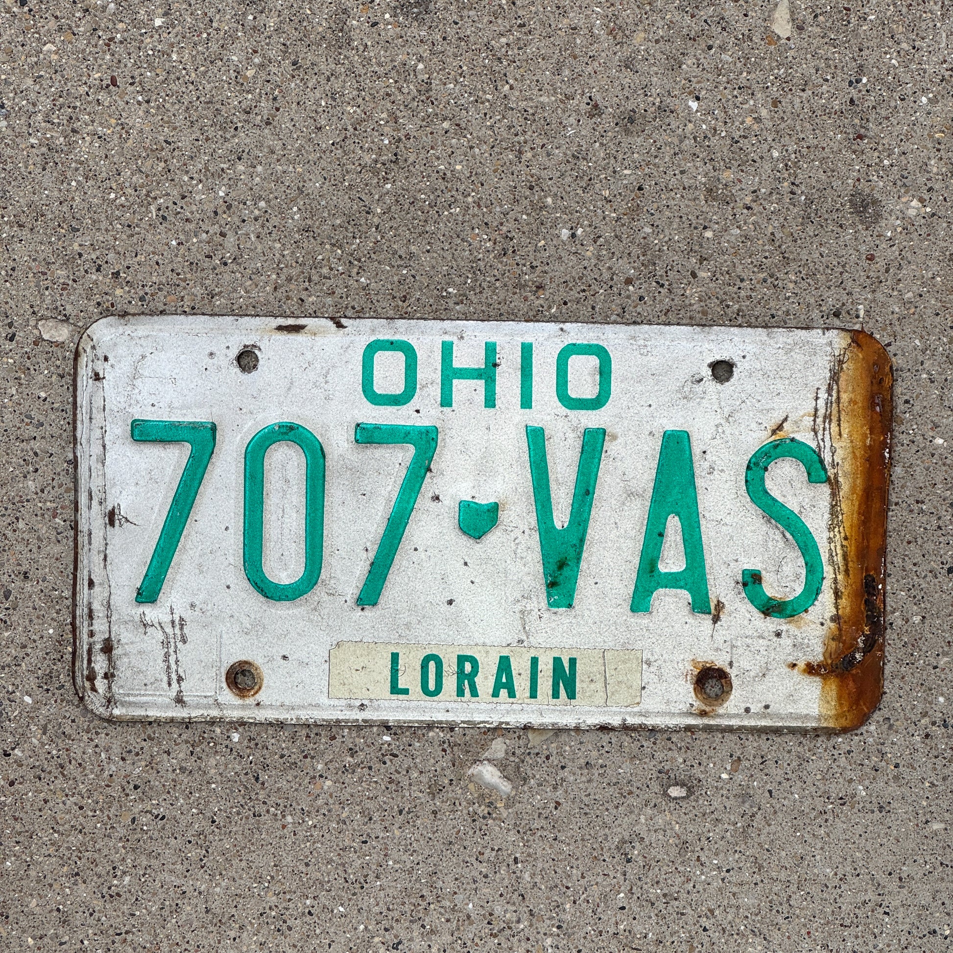 Photo of a 1985 Ohio License Plate Auto Tag 2 Vintage Garage 707 VAS with original patina