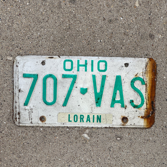 Photo of a 1985 Ohio License Plate Auto Tag 2 Vintage Garage 707 VAS with original patina