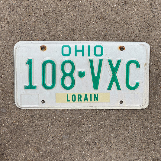 Photo of a 1985 Ohio License Plate Auto Tag Garage Decor Vintage 108 VXC with original patina