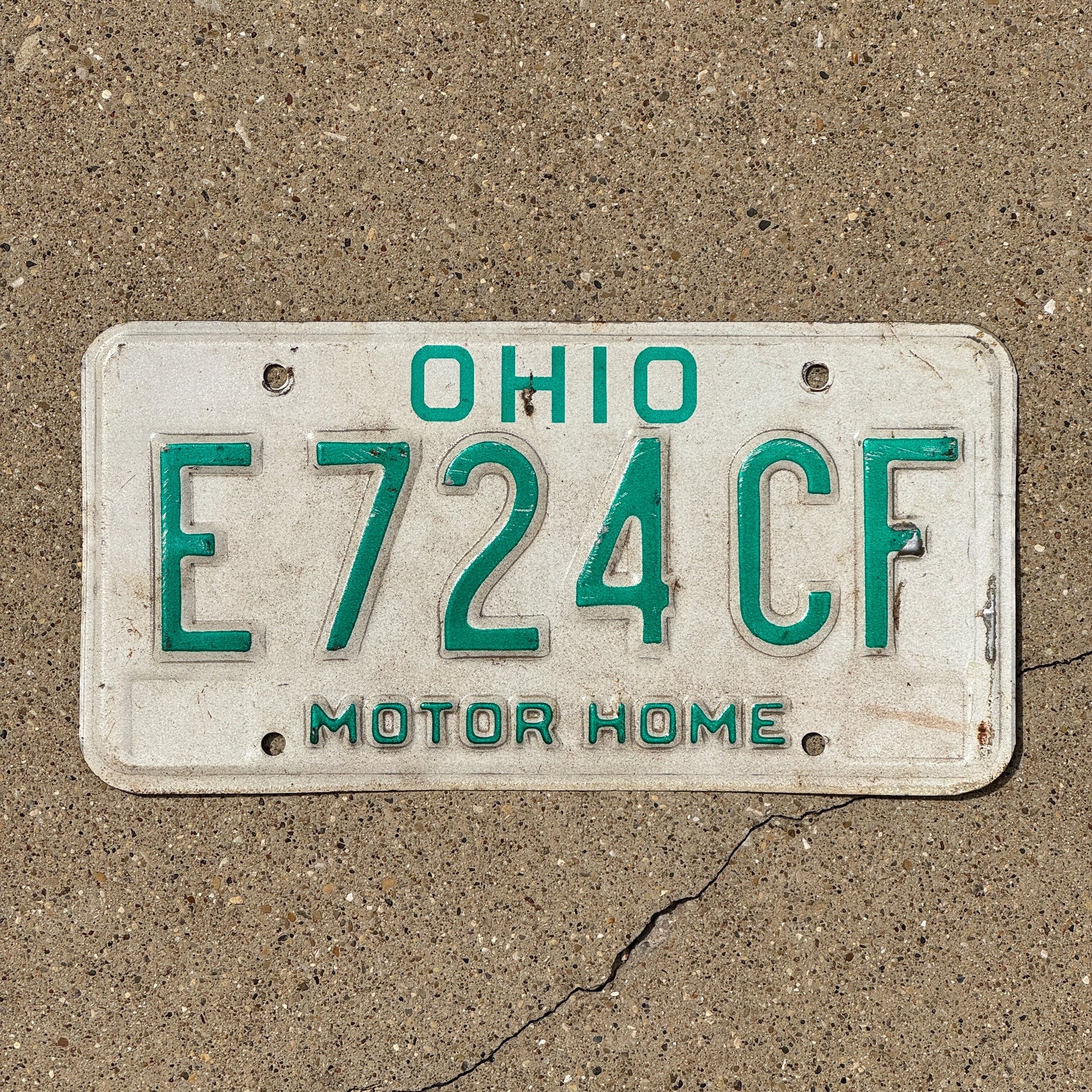 Photo of a 1985 Ohio Motor Home License Plate Auto Tag 1 Garage Decor E 724 CF