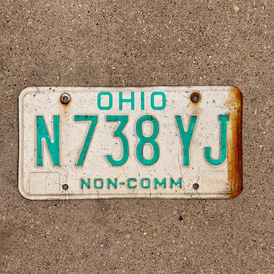Photo of a 1985 Ohio Truck License Plate Auto Tag 2 Vintage Garage Non Commercial N 738 YJ with original patina