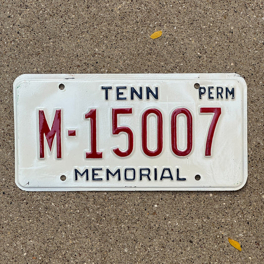 Photo of a 1985 Tennessee Memorial License Plate Auto Tag Garage Decor Vintage | Issued to Medal of Honor recipients, POW, and DAVs | M 15007