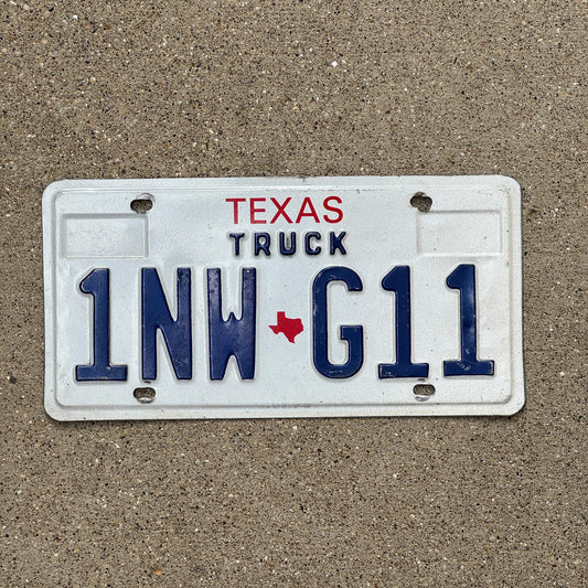 Photo of a 1985 Texas Truck License Plate Auto Tag Garage Decor Vintage 1NW G11