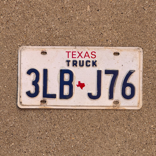Photo of a 1985 Texas Truck License Plate Auto Tag Garage Decor Vintage 3LB J76