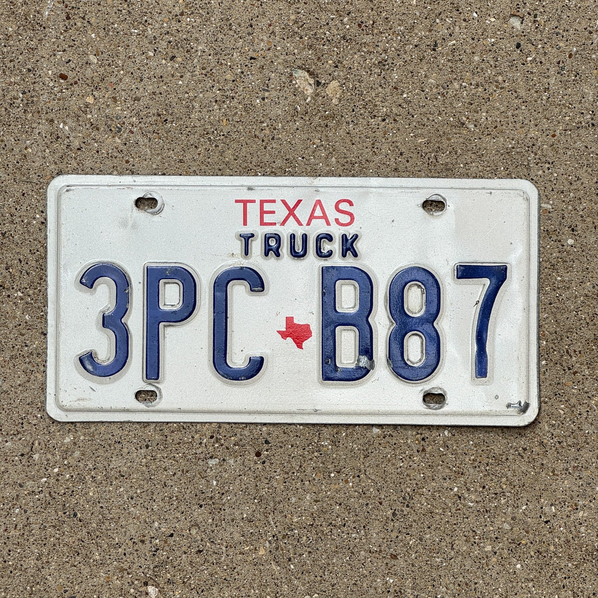 Photo of a 1985 Texas Truck License Plate Auto Tag Garage Decor Vintage 3PC B87