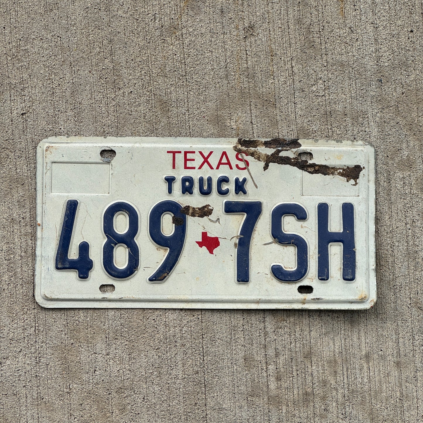 Photo of a 1985 Texas Truck License Plate Auto Tag Garage Decor Vintage 489 7 SH with original patina