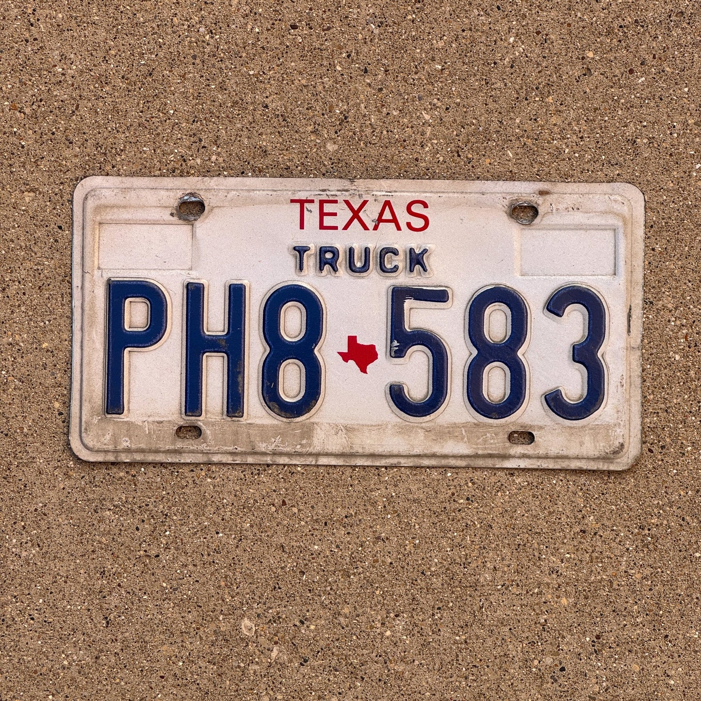 Photo of a 1985 Texas Truck License Plate Auto Tag Garage Decor Vintage PH8 583