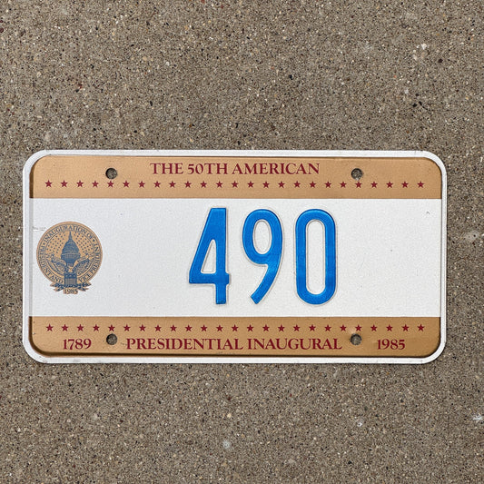 Photo of a 1985 Washington DC Inaugural License Plate Auto Tag Garage Decor Vintage Reagan Politics Political Low Number Three Digit 490 with original patina
