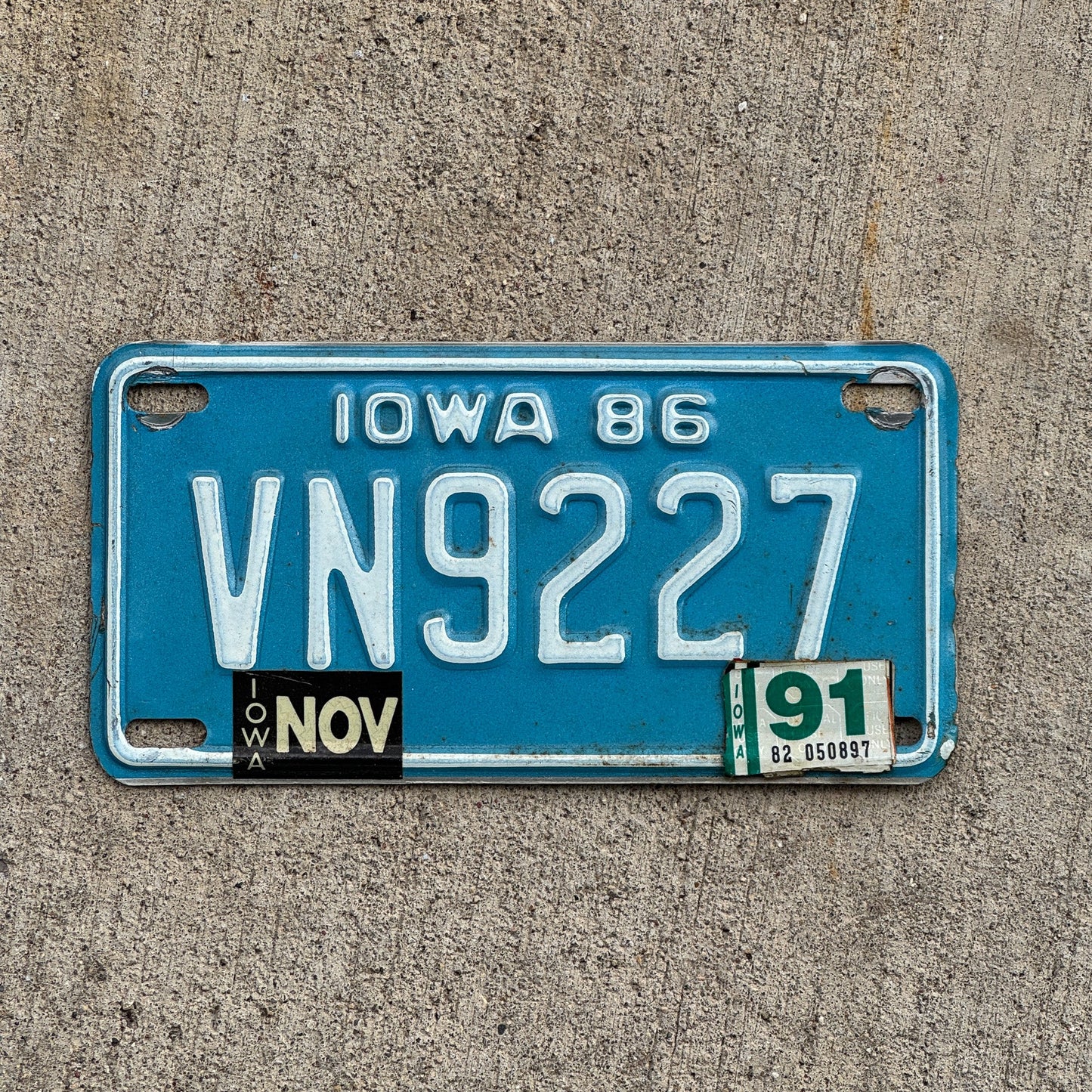 Photo of a 1986 1991 Iowa Motorcycle License Plate Auto Tag Garage Decor Vintage VN 9227