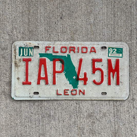 Photo of a 1986 1992 Florida License Plate Auto Tag Garage Decor Vintage IAP 45M with original patina