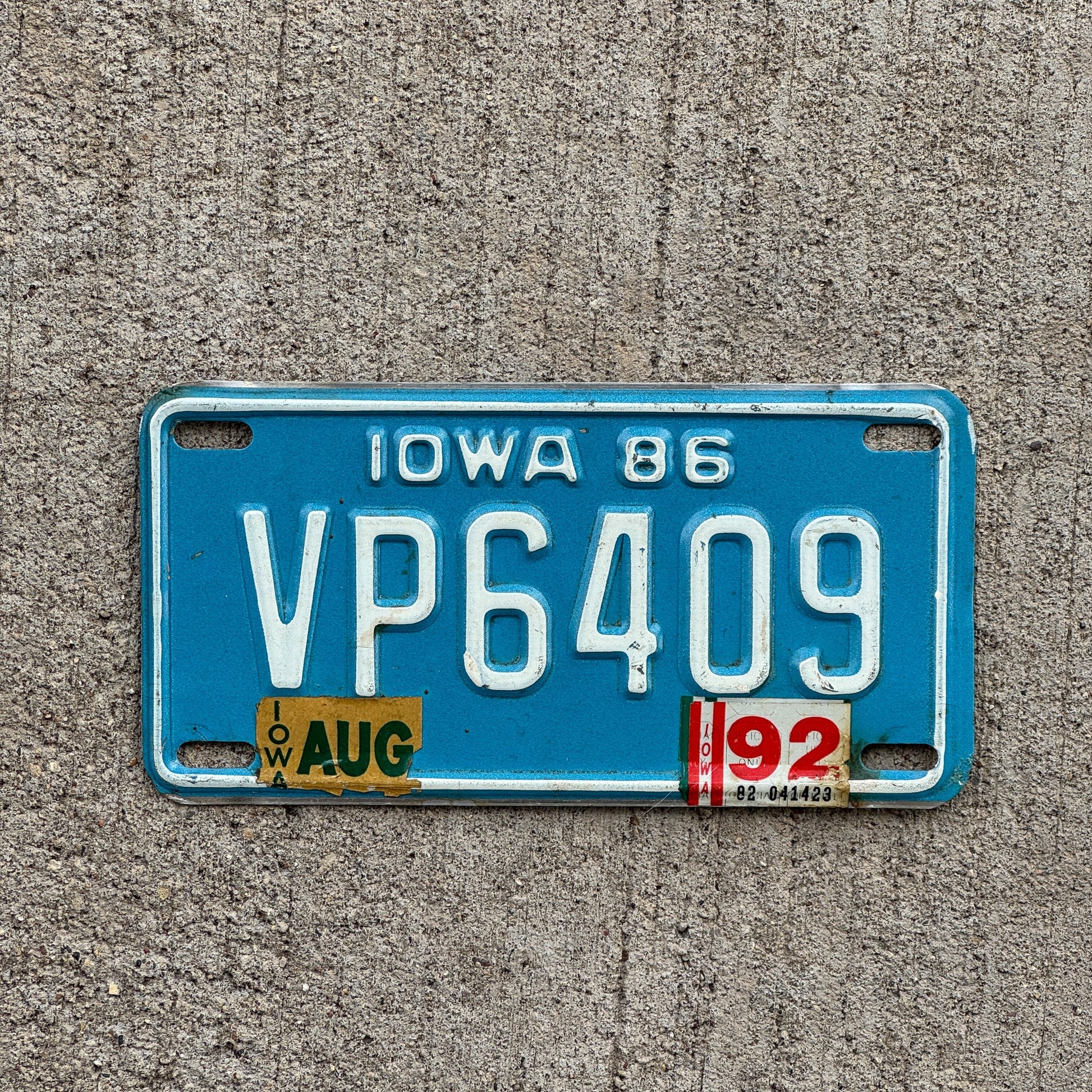 Photo of a 1986 1992 Iowa Motorcycle License Plate Auto Tag Garage Decor Vintage VP 6409