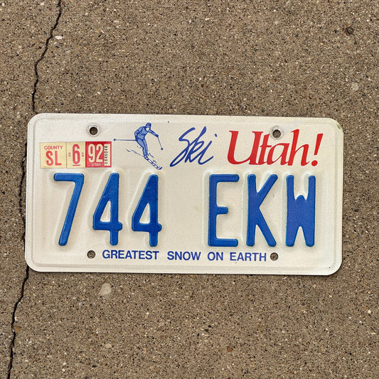 Photo of a 1986 1992 Utah License Plate Auto Tag Garage Decor Vintage 744 EKW with original patina
