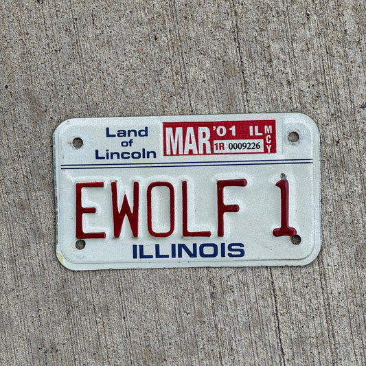 Photo of a 1986 2001 Illinois Moped Vanity License Plate Auto Tag Garage Decor Vintage EWOLF 1 with original patina