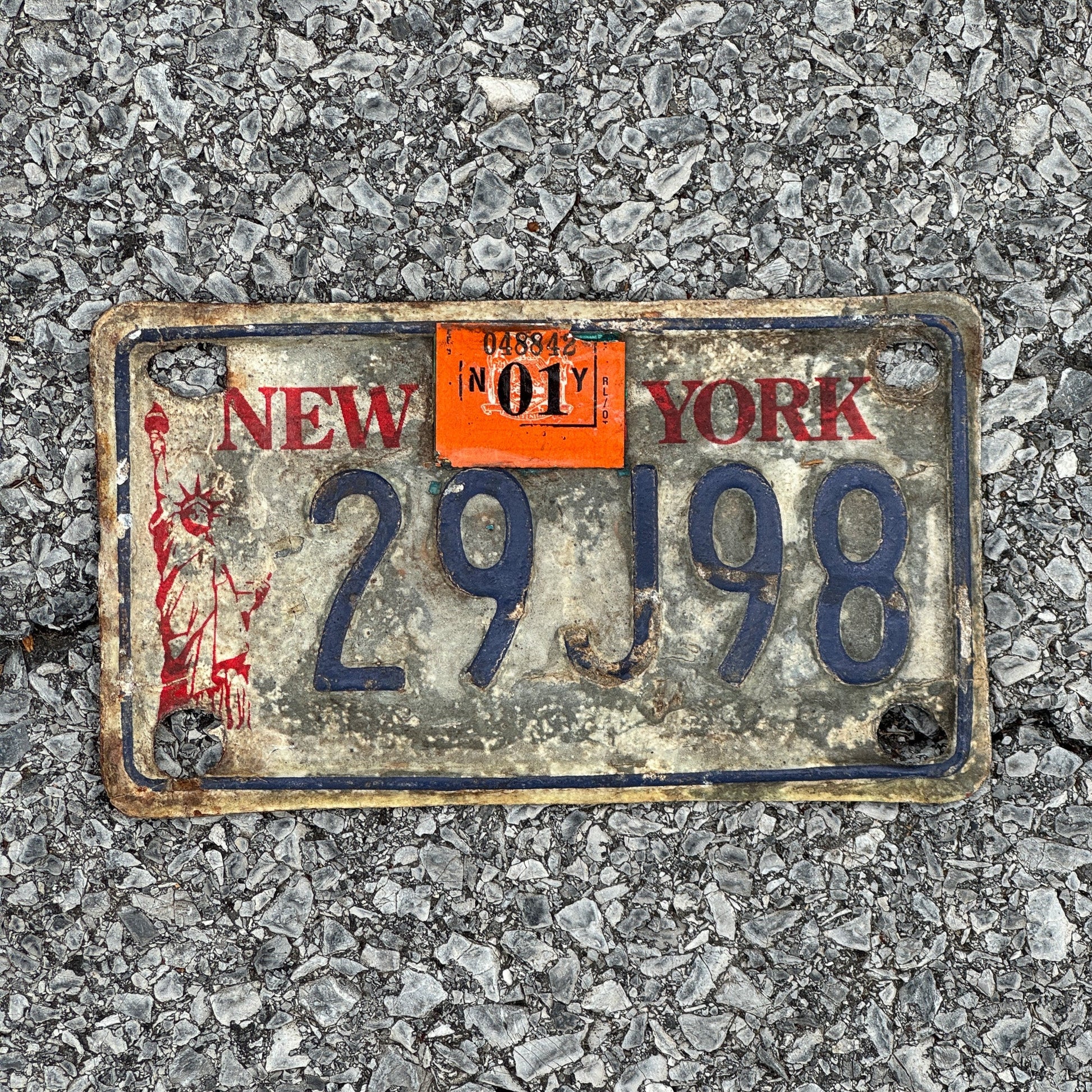 Photo of a 1986 2001 New York Motorcycle License Plate Auto Tag Garage Decor Vintage Liberty Base 29J98