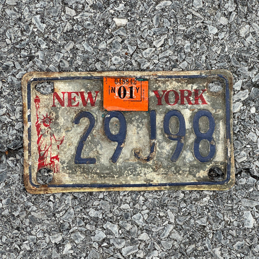 Photo of a 1986 2001 New York Motorcycle License Plate Auto Tag Garage Decor Vintage Liberty Base 29J98
