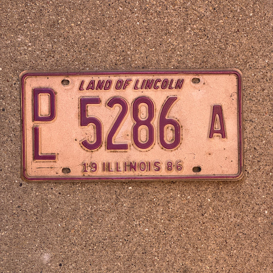 Photo of a 1986 Illinois Dealer License Plate Auto Tag 1 Vintage Garage 5286 A with original patina