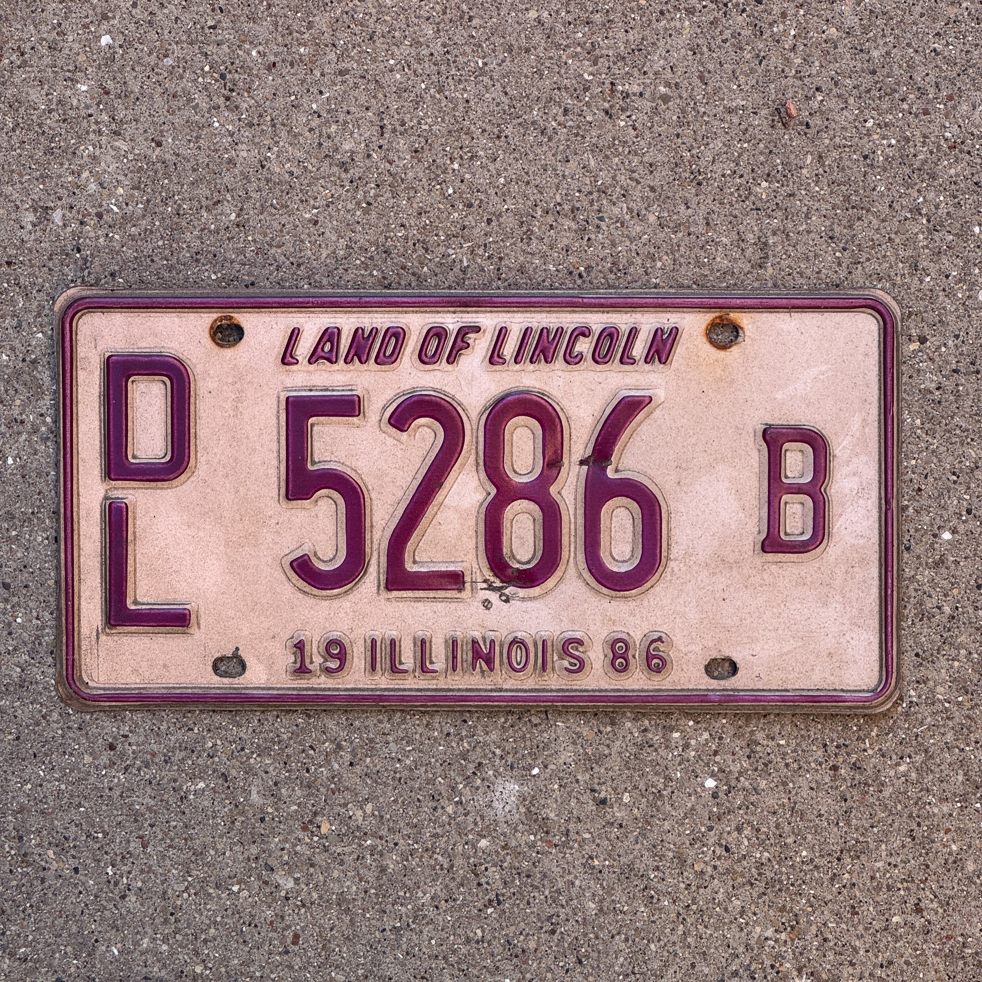 Photo of a 1986 Illinois Dealer License Plate Auto Tag 2 Vintage Garage 5286 B with original patina