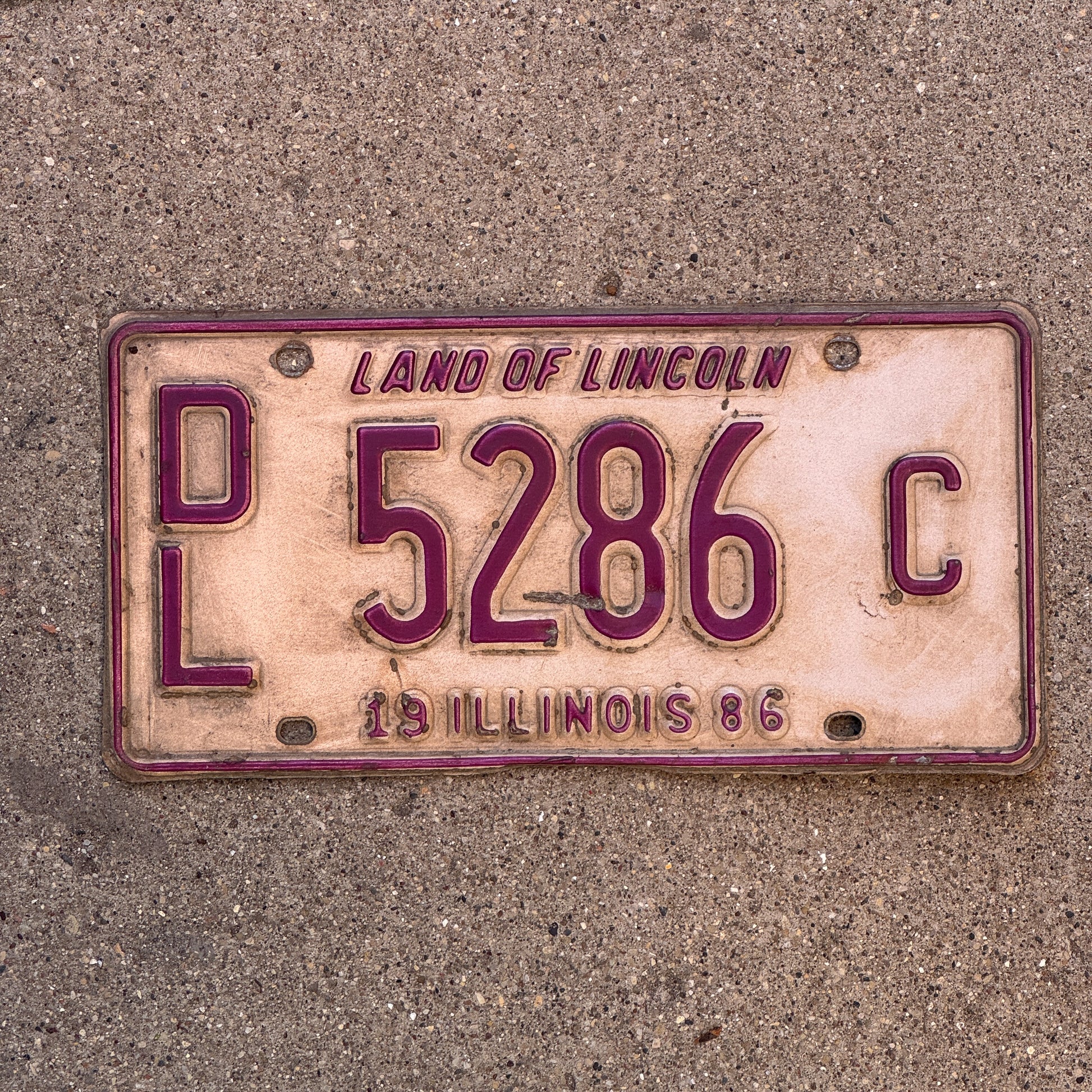 Photo of a 1986 Illinois Dealer License Plate Auto Tag 2 Vintage Garage 5286 C with original patina