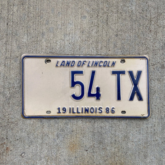 Photo of a 1986 Illinois Taxi License Plate Auto Tag Garage Decor Vintage Low Number Two Digit 54 TX with original patina