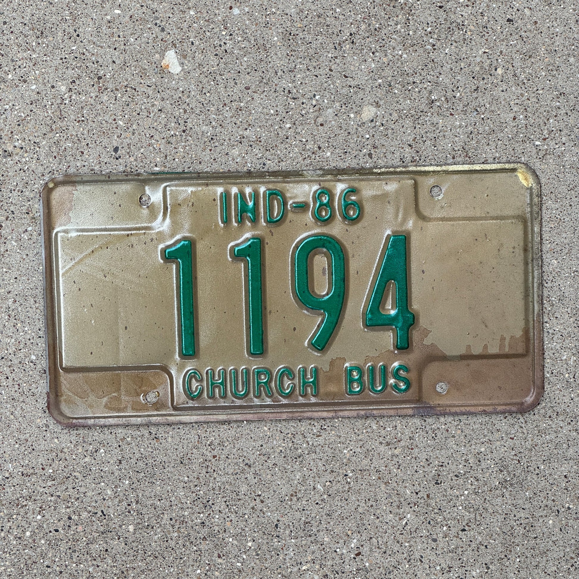 Photo of a 1986 Indiana Church Bus License Plate Auto Tag Garage Decor Vintage 1194