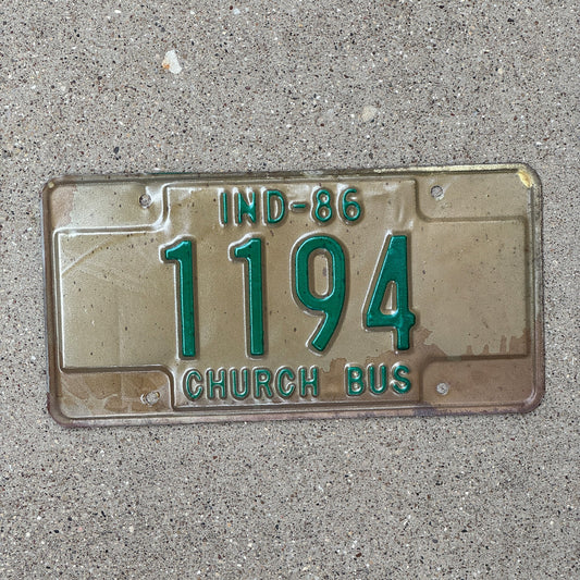 Photo of a 1986 Indiana Church Bus License Plate Auto Tag Garage Decor Vintage 1194