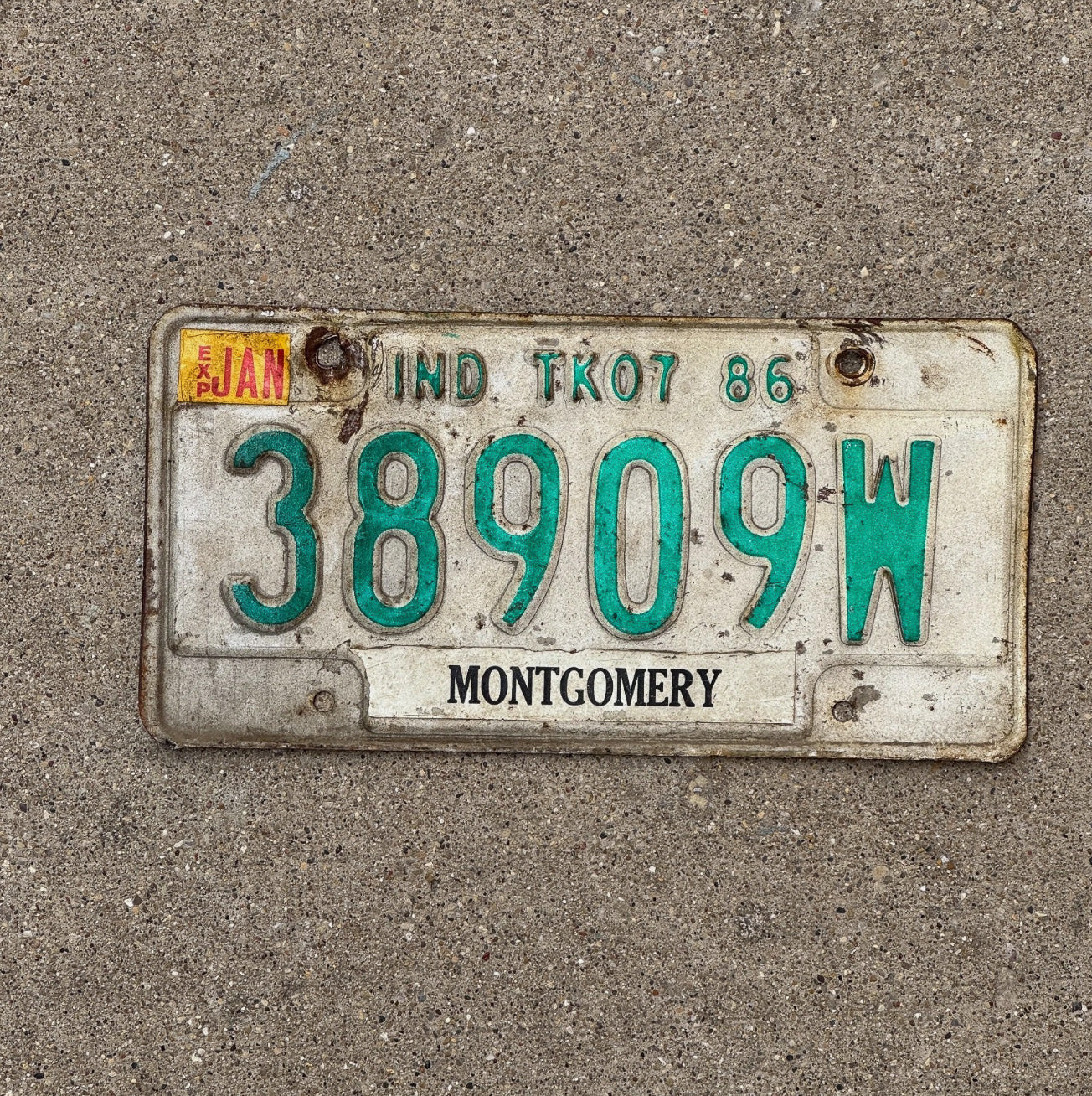Photo of a 1986 Indiana Truck License Plate Auto Tag Garage Decor 38909 W